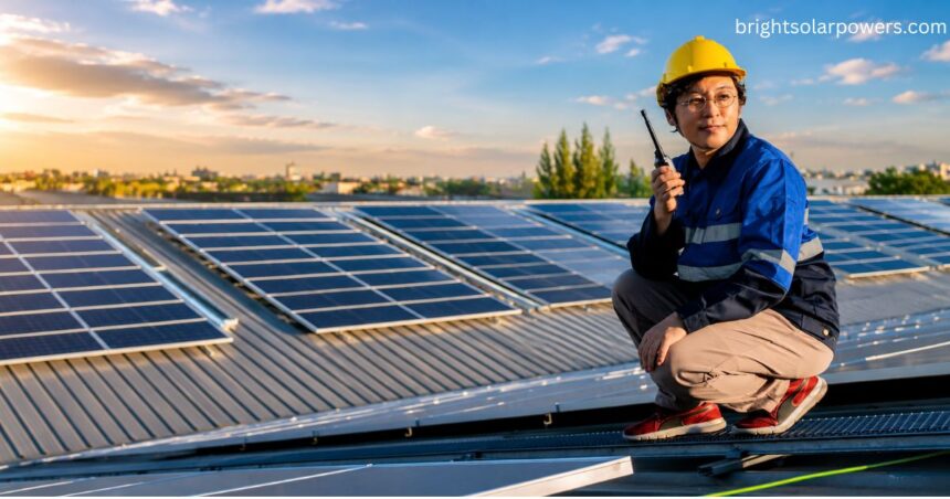 Technician inspecting rooftop solar panels with a flat plate solar collector system for efficient renewable energy generation.
