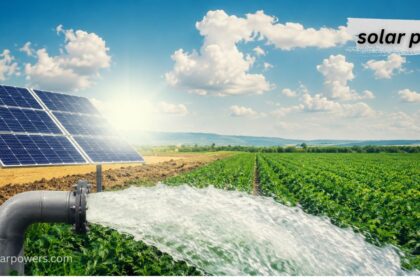 Solar pump system with photovoltaic panels delivering water flow to a green agricultural irrigation field under bright sunlight