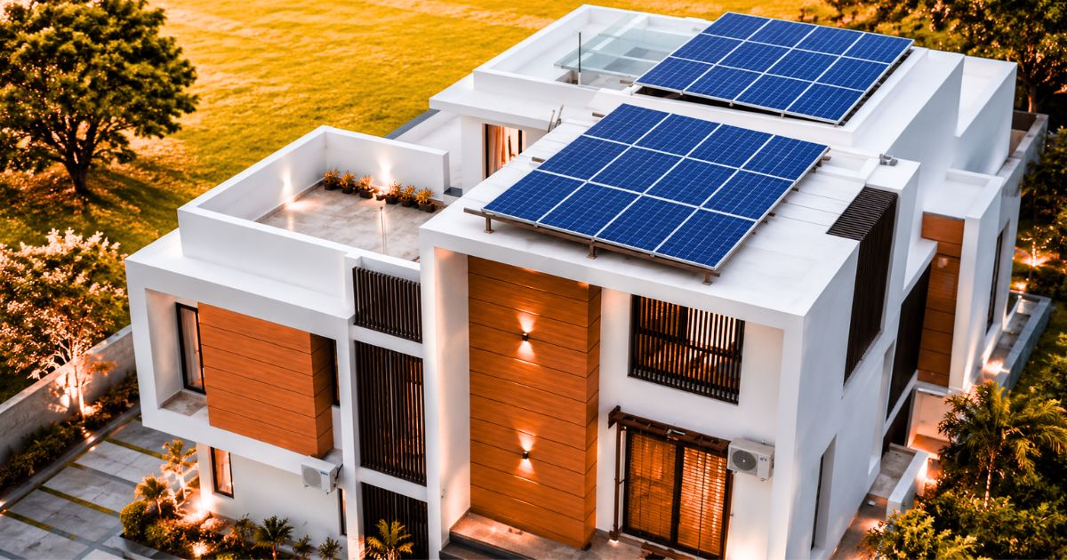 Modern home with solar rooftop panels for clean and sustainable energy generation.