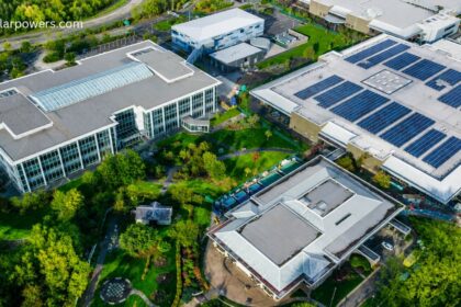 Solarium green energy IPO GMP solar campus with rooftop solar panels on commercial buildings for clean energy production