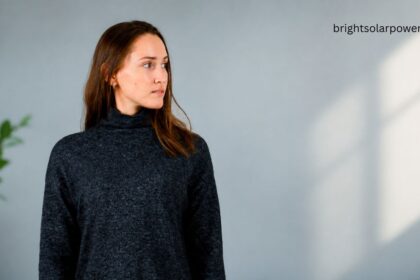 Woman wearing a stylish high neck sweater.