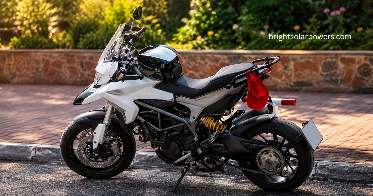 Apache 125 cc motorcycle parked on a roadside.